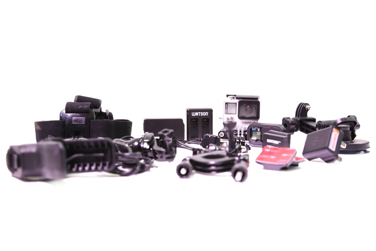 GoPro action camera with mounts, illustrative equipment